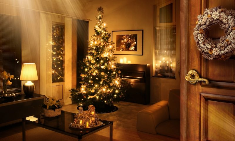 Christmas tree in living room warm feeling opened door